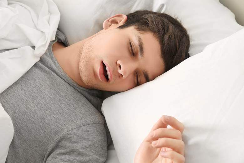 Young man with sleep apnea in West Edmonton, AB snoring
