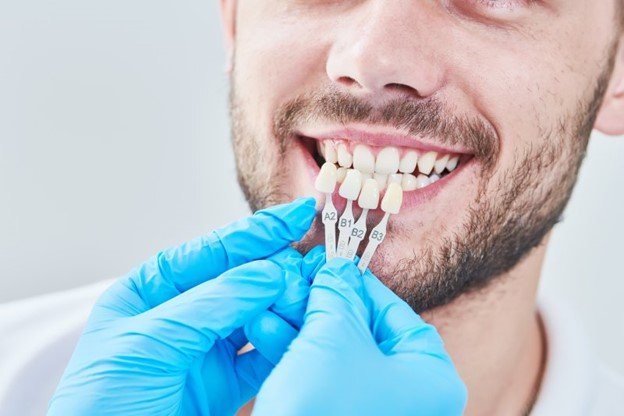 dentist giving a patient veneers in Edmonton
